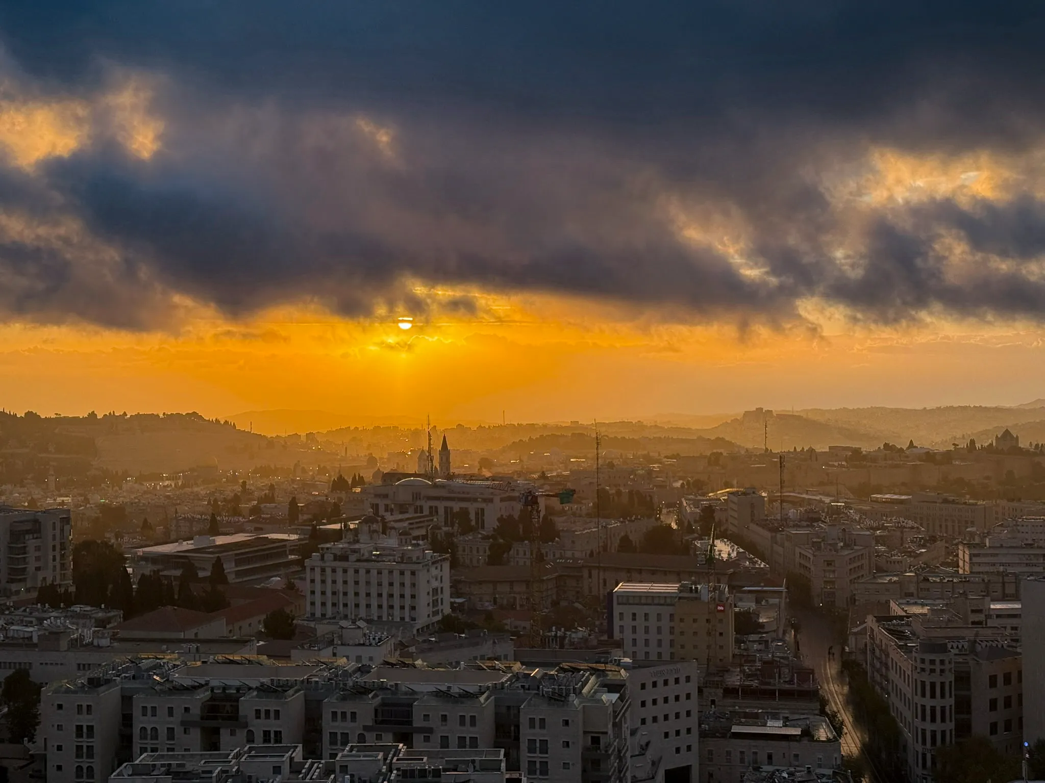 Storm light breaking over the rooftops of Jerusalem